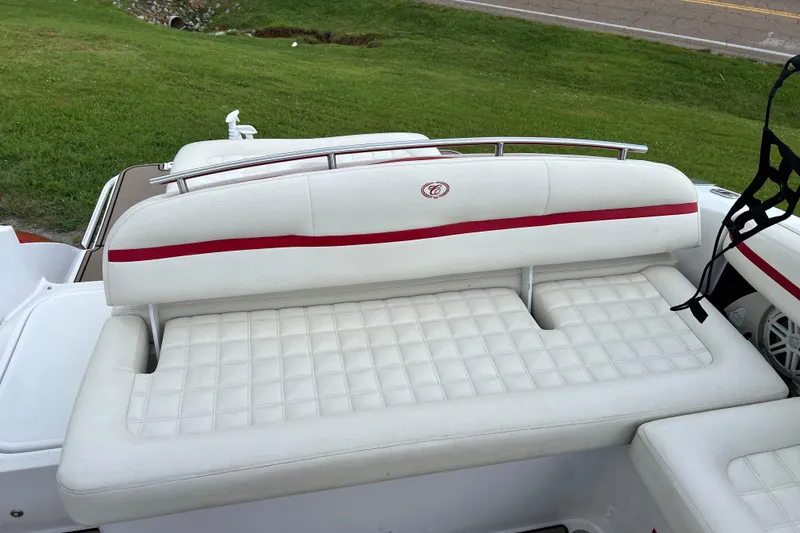 Slide: The Image of 2018 Cobalt R5 Surf boat with white and red cushioned seating. - 14