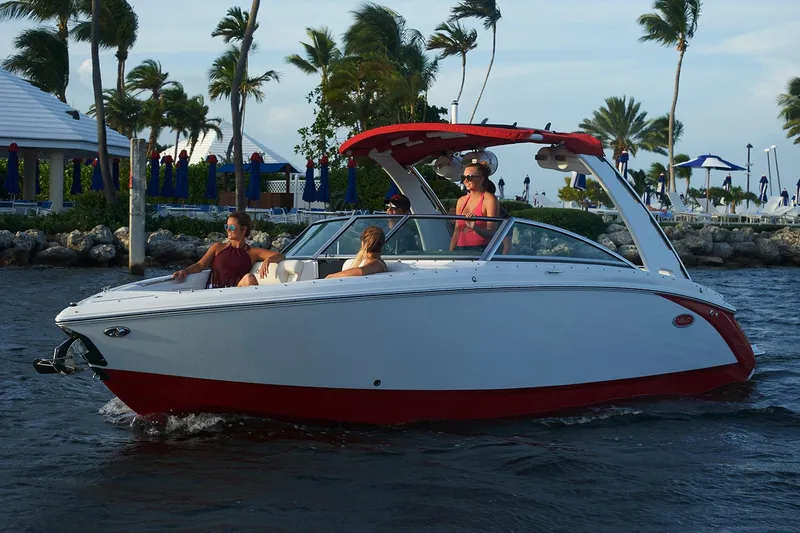 Slide: The Image of Manufacturer Provided Image: 2018 Cobalt R5 Surf boat cruising with passengers on a sunny day. - 4