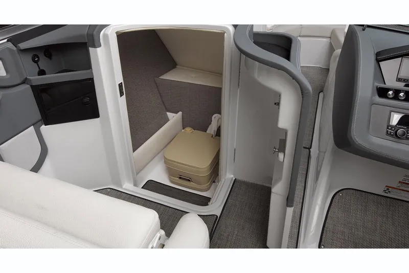 Slide: The Image of Manufacturer Provided Image: 2018 Cobalt R5 Surf boat interior with storage compartment and portable toilet. - 9