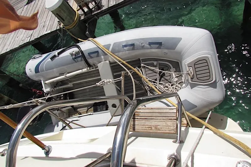 Slide: The Image of Overhead view of a 1992 Hatteras 40 Motor Yacht with an inflatable boat docked. - 5