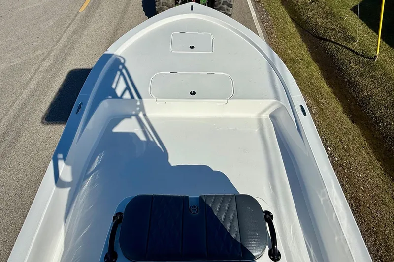 Slide: The Image of 2026 Shallow Sport 24 Sport boat on road, top view. - 14