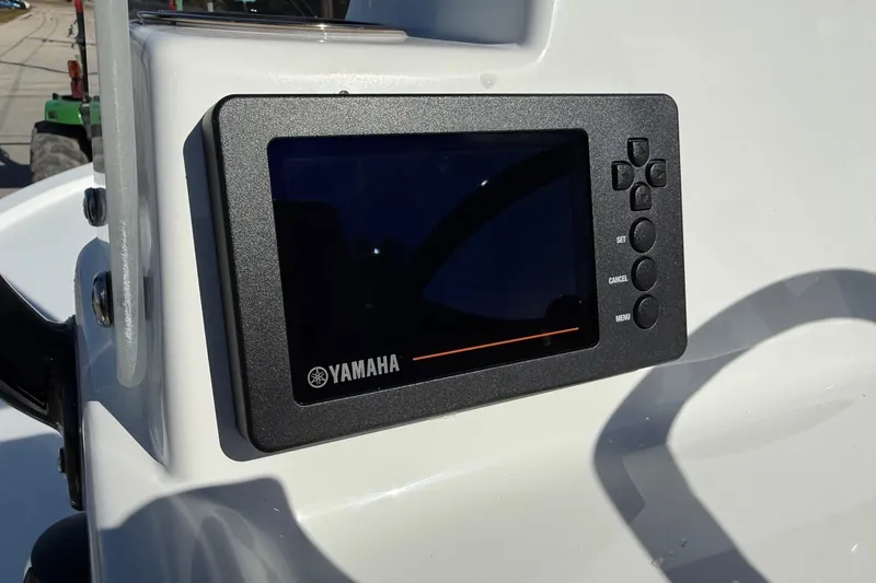 Slide: The Image of Yamaha display on 2026 Shallow Sport 24 Sport boat dashboard. - 17