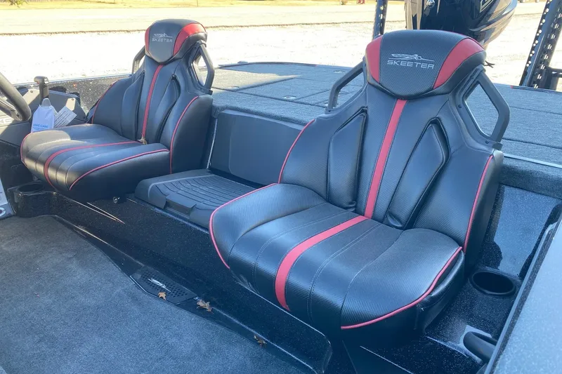 Slide: The Image of 2026 Skeeter ZXE20 boat seats with black and red design, showcasing modern style and comfort. - 11