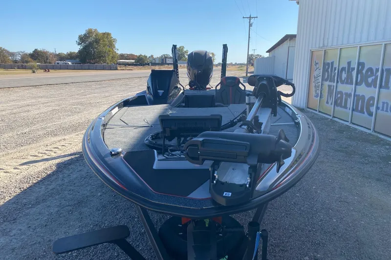 Slide: The Image of 2026 Skeeter ZXE20 boat parked outside Black Bear Marine dealership. - 3