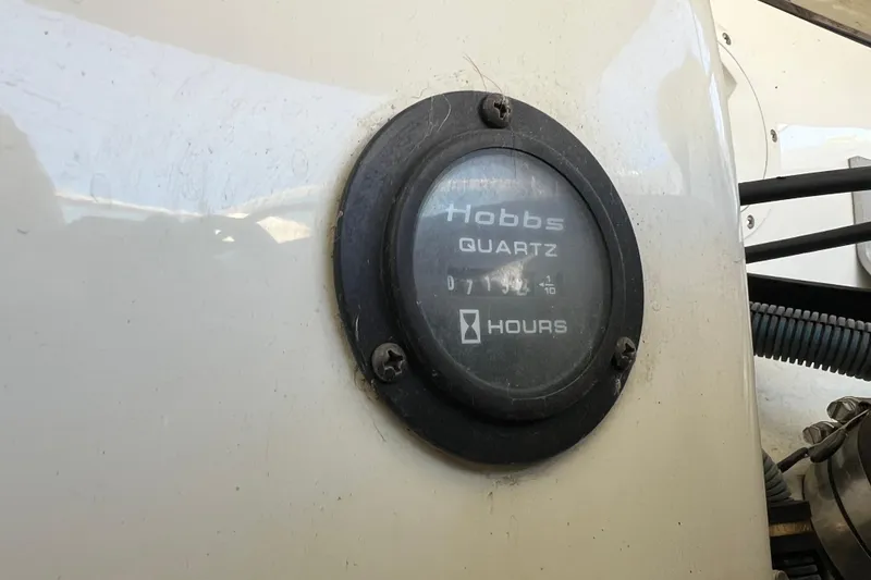 Slide: The Image of Hobbs hour meter on 2008 Cobalt 252 boat, displaying usage hours. - 20