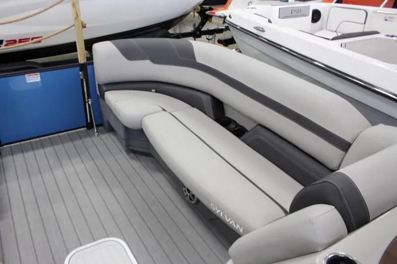 Slide: The Image of 2025 Sylvan L5 CLZ DH boat interior with sleek gray seating and modern design. - 12