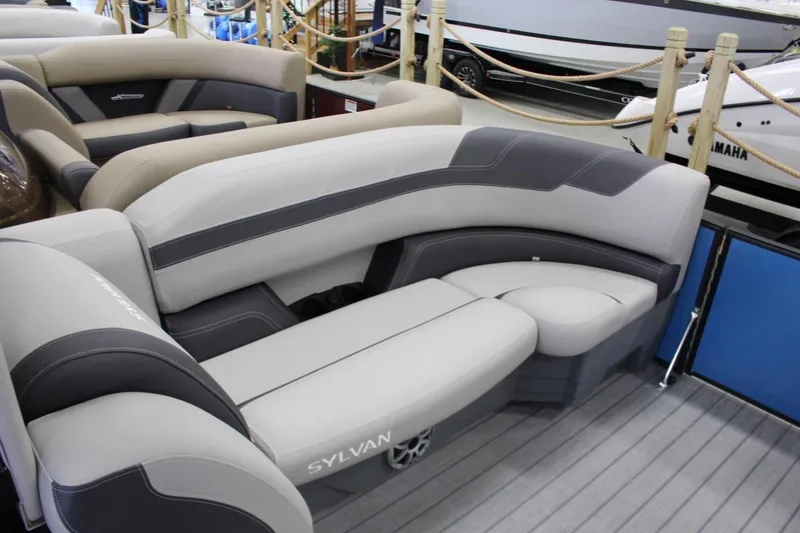 Slide: The Image of 2025 Sylvan L5 CLZ DH pontoon boat interior with luxurious seating. - 13