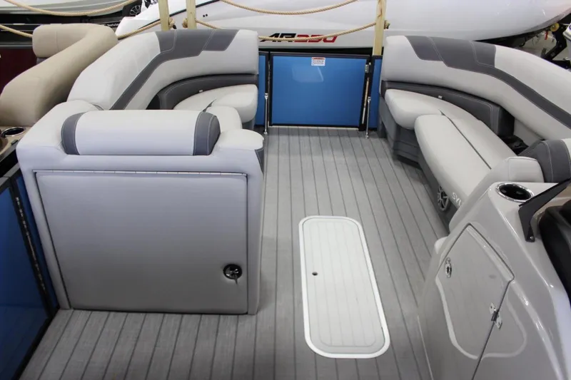 Slide: The Image of 2025 Sylvan L5 CLZ DH pontoon boat interior with gray seating and flooring. - 15