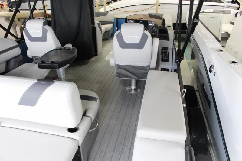 Slide: The Image of Interior of 2025 Sylvan L5 CLZ DH boat with modern seating and sleek design. - 5