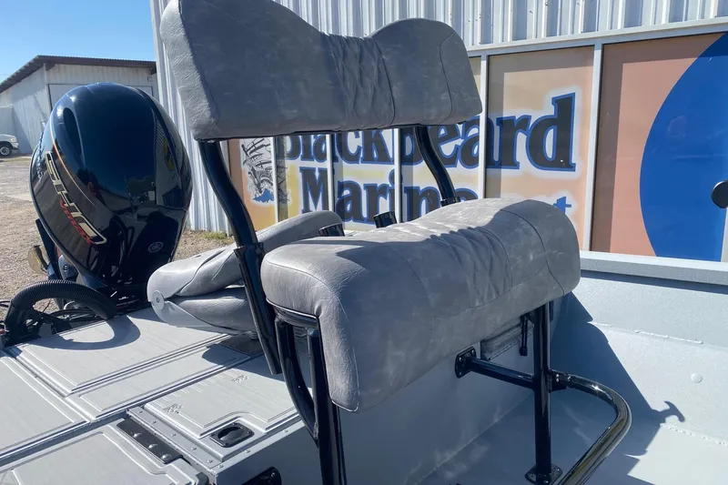 Slide: The Image of 2026 G3 Bay 19 GX boat with dual seats and outboard motor at Blackbeard Marine. - 16