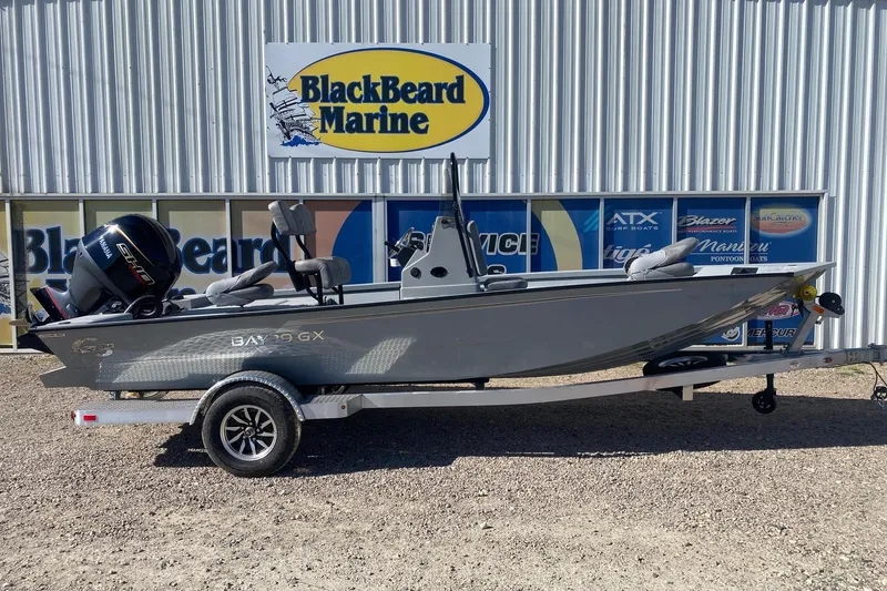 The Image of 2026 G3 Bay 19 GX boat on trailer at BlackBeard Marine dealership. - 8