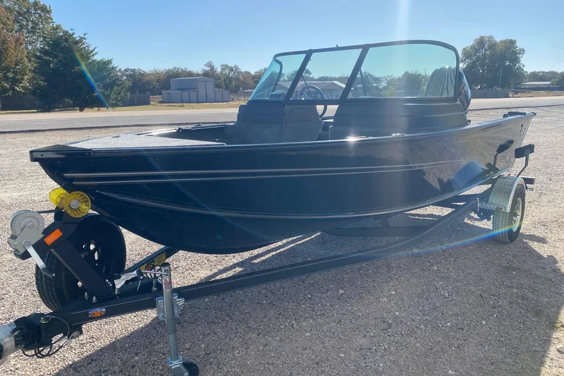 Slide: The Image of 2026 G3 Angler V178 F boat on trailer in sunny outdoor setting. - 3