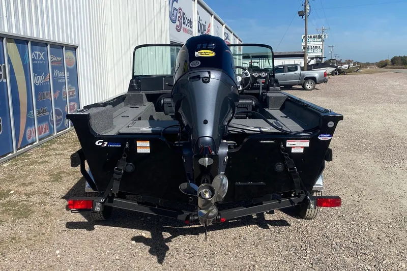 Slide: The Image of 2026 G3 Angler V178 F boat with outboard motor, parked outside dealership. - 4