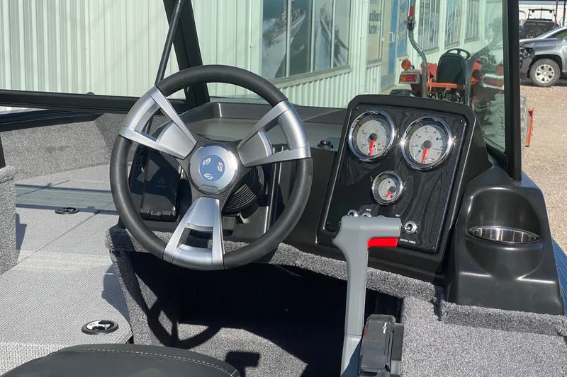 Slide: The Image of 2026 G3 Angler V178 F boat dashboard with steering wheel and gauges. - 6