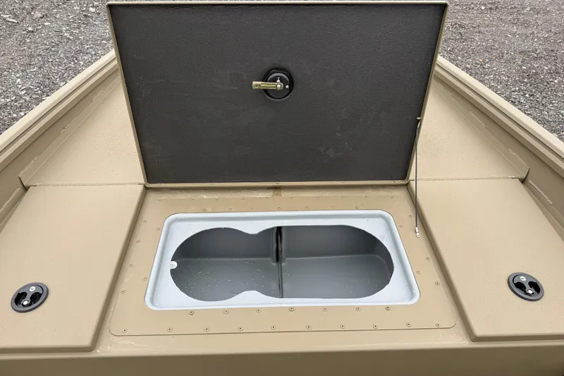 Slide: The Image of Open storage compartment on 2026 G3 Gator Tough 17 SC boat. - 15