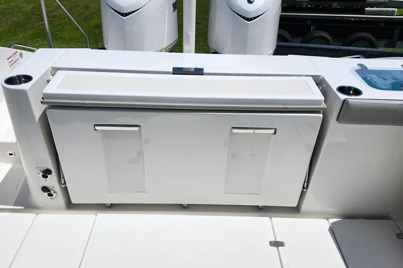 Slide: The Image of 2026 Pursuit S 328 Sport boat deck with open transom door. - 15