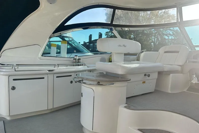 Slide: The Image of Luxurious interior of 2006 Sea Ray 52 Sundancer yacht with sleek seating and modern design. - 12