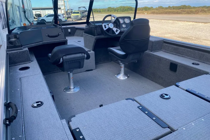 Slide: The Image of 2026 G3 Angler V178 F boat interior with seating and dashboard. - 11