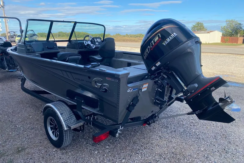 Slide: The Image of 2026 G3 Angler V178 F boat with Yamaha engine on trailer, parked outdoors. - 4