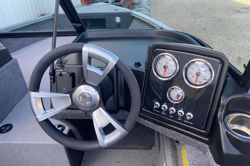 Slide: The Image of Steering wheel and dashboard of 2026 G3 Angler V178 F boat, featuring modern gauges. - 7