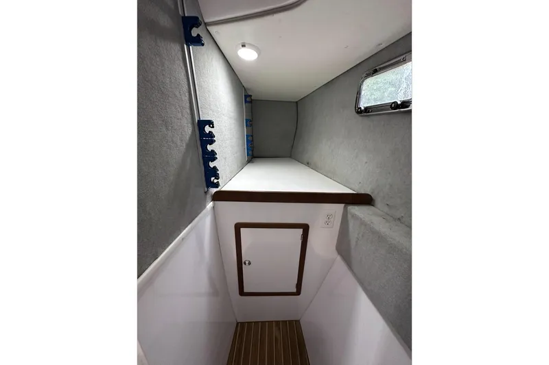 Slide: The Image of Interior cabin of 2002 Endeavour Trawlercat 36 with storage and window. - 43