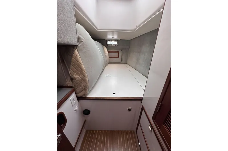 Slide: The Image of Interior cabin of 2002 Endeavour Trawlercat 36 with cozy sleeping area. - 52