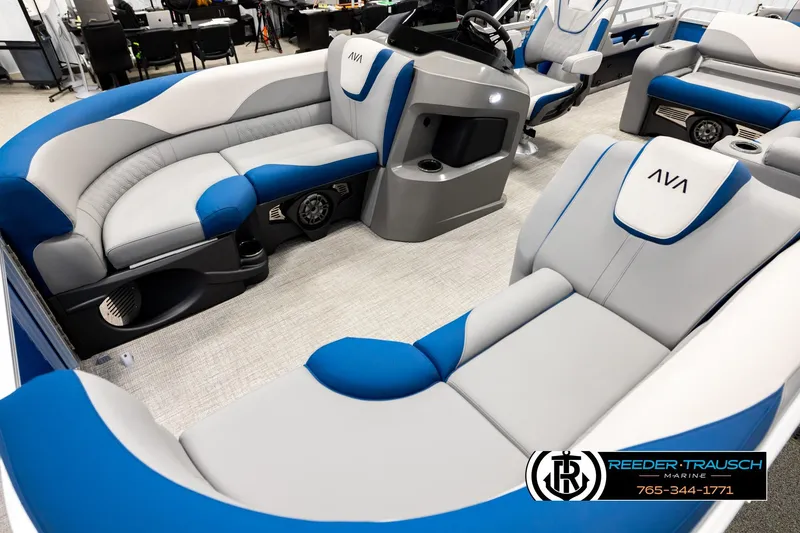 Slide: The Image of 2026 Avalon LSZ Vrl boat interior with blue and gray seating, showcasing modern design. - 10