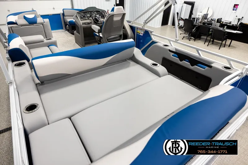 Slide: The Image of 2026 Avalon LSZ Vrl pontoon boat interior with modern seating and control panel. - 11