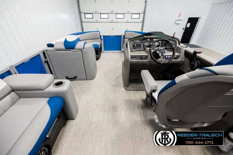 Slide: The Image of Interior of 2026 Avalon LSZ Vrl pontoon boat with modern seating and control panel. - 17