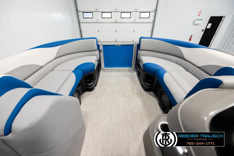 Slide: The Image of Interior of 2026 Avalon LSZ Vrl pontoon boat with blue and gray seating. - 18