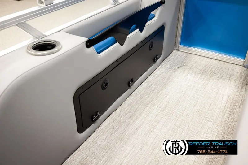 Slide: The Image of 2026 Avalon LSZ Vrl boat interior with cup holder and storage compartment. - 25