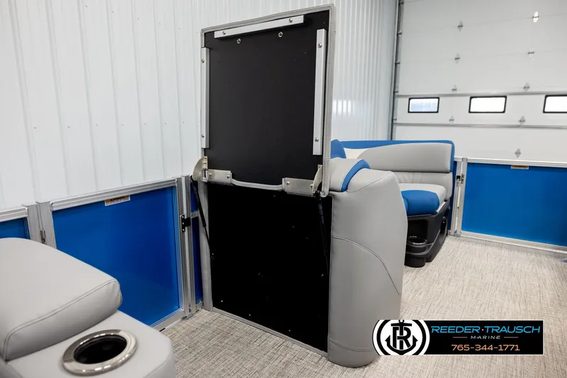 Slide: The Image of Interior of 2026 Avalon LSZ Vrl pontoon boat with blue and gray seating. - 28