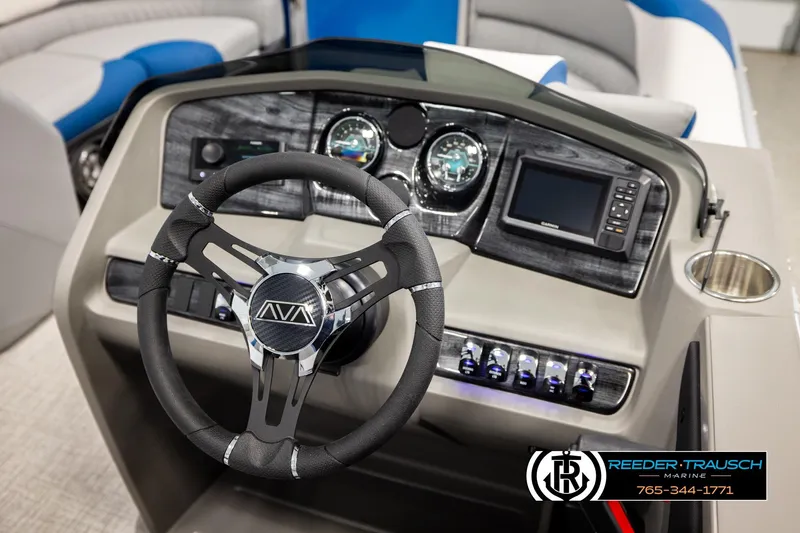Slide: The Image of 2026 Avalon LSZ Vrl boat dashboard with steering wheel and navigation controls. - 29