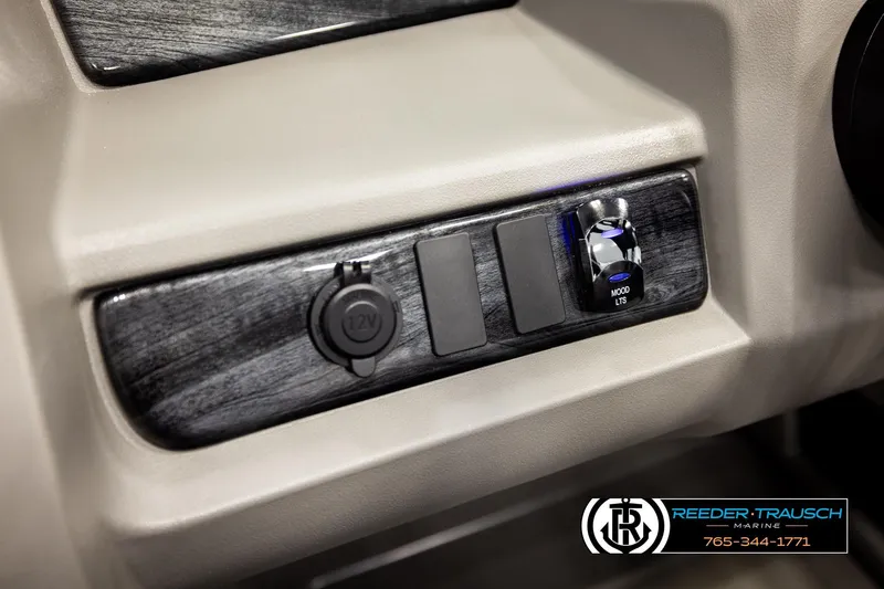 Slide: The Image of Control panel of 2026 Avalon LSZ Vrl with 12V socket and mood lights switch. - 32