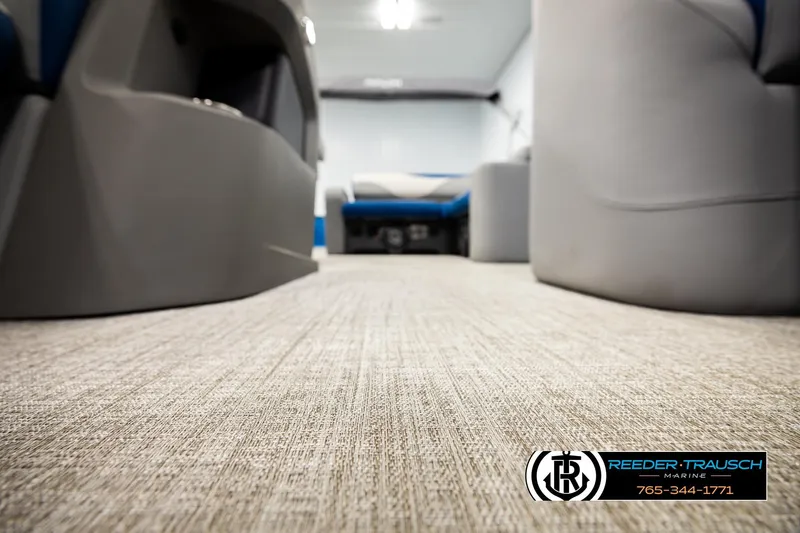 Slide: The Image of 2026 Avalon LSZ Vrl interior with plush seating and carpeted flooring, Reeder-Trausch Marine logo visible. - 45