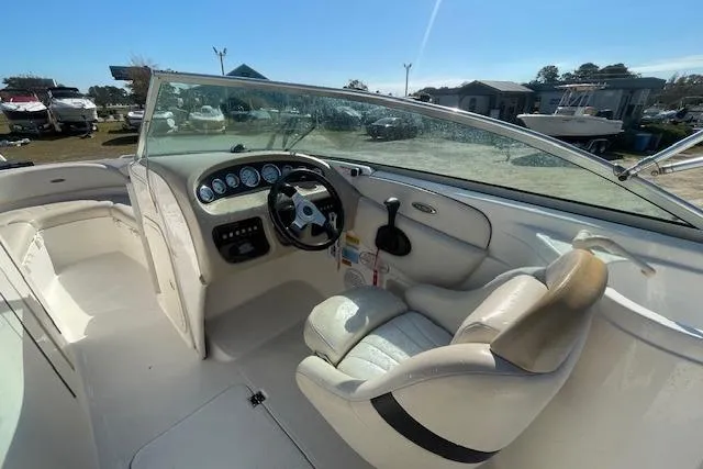 Slide: The Image of 2001 Chaparral 230 SSi boat interior with steering wheel and dashboard. - 10