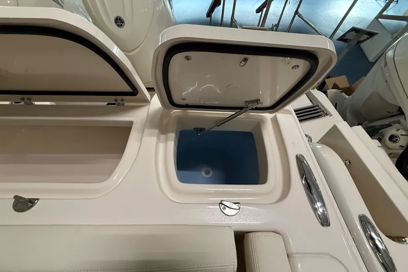 Slide: The Image of Open storage compartments on a 2026 Grady-White Freedom 275 boat. - 29