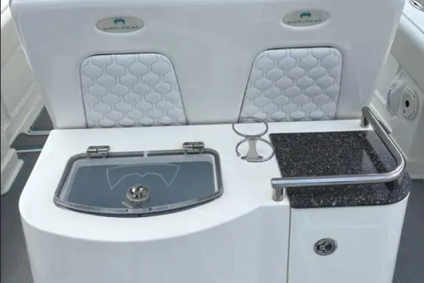 Slide: The Image of World Cat 280 CC-X 2020 boat interior with sleek seating and modern amenities. - 3