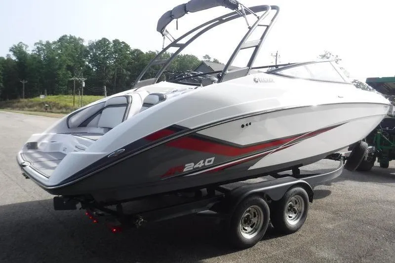 Slide: The Image of 2019 Yamaha Boats AR240 on trailer, sleek design, white and red accents. - 3