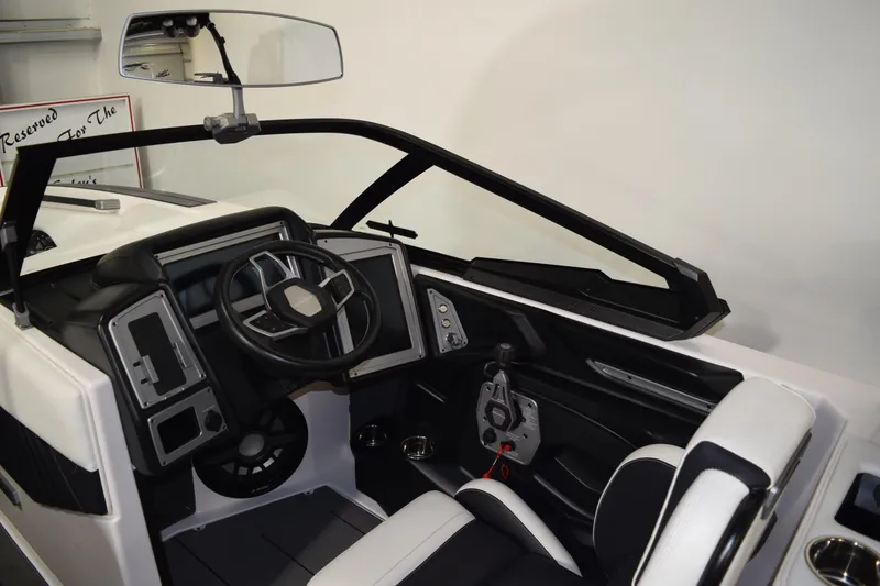 Slide: The Image of 2023 Supra SA boat interior with modern steering and dashboard design. - 10