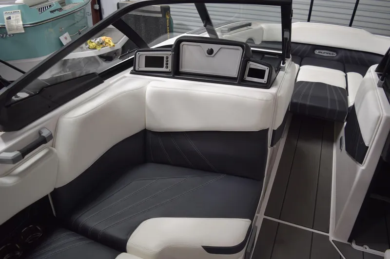 Slide: The Image of 2023 Supra SA boat interior with modern seating and dashboard design. - 14