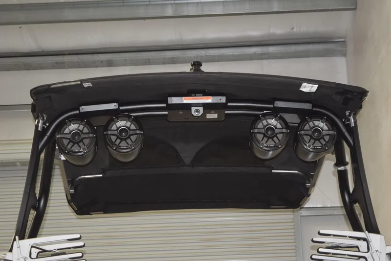 Slide: The Image of 2023 Supra SA boat with mounted speakers on the wakeboard tower. - 5