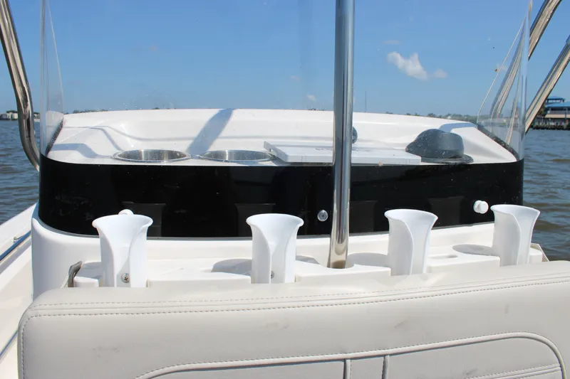 Slide: The Image of Boston Whaler 150 Montauk 2026, interior view with cup holders. - 15