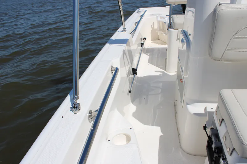 Slide: The Image of Interior of Boston Whaler 150 Montauk 2026 on the water. - 16