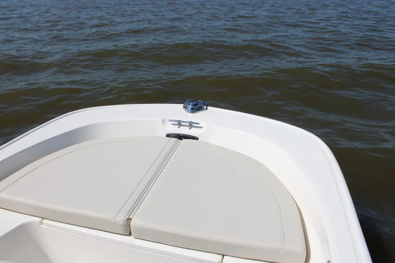 Slide: The Image of 2026 Boston Whaler 150 Montauk bow view on calm water. - 28
