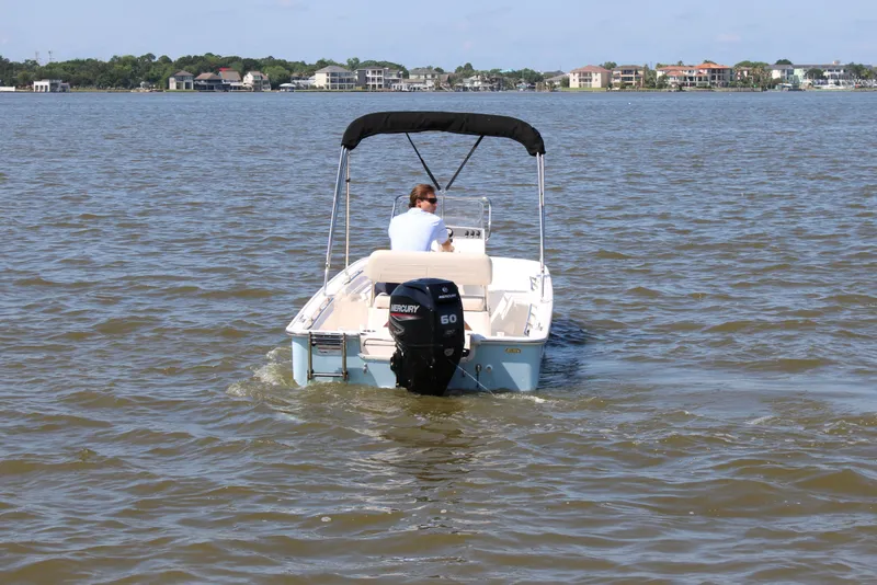 Slide: The Image of Boston Whaler 150 Montauk 2026 on calm waters. - 9