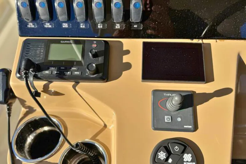 Slide: The Image of Helm of 2020 Sailfish 360 CC boat with dual screens and controls. - 20