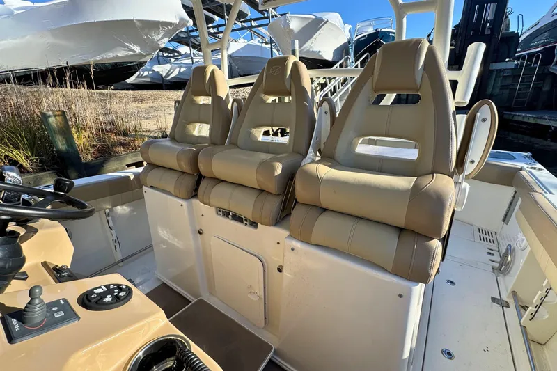 Slide: The Image of Luxurious seating on 2020 Sailfish 360 CC boat with ocean view. - 24