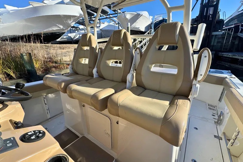 Slide: The Image of Luxurious beige seating on 2020 Sailfish 360 CC boat, showcasing comfort and style. - 25