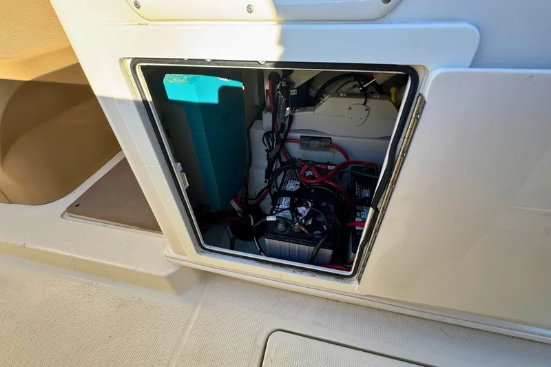 Slide: The Image of Battery compartment of 2020 Sailfish 360 CC boat, showing wiring and connections. - 30
